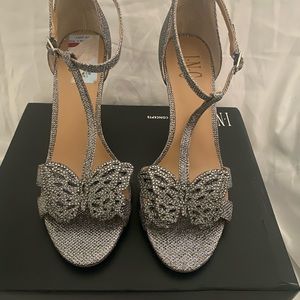 Brand new T strap heels with butterfly detail